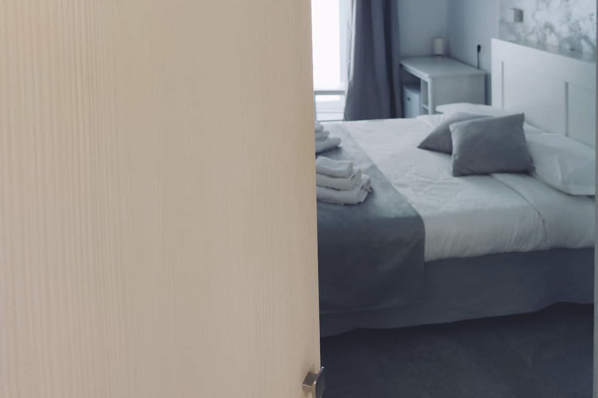 Doppia Deluxe | Copriletto in piuma, minibar, una cassaforte in camera, una scrivania