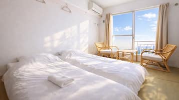 Quarto Twin em estilo japonês | Quartos à prova de som, ferros/tábuas de passar roupa, Wi-Fi de cortesia