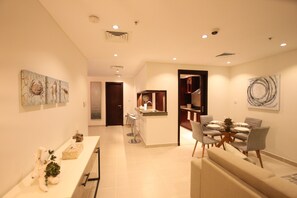 Deluxe Studio Suite, 1 King Bed with Sofa bed, Accessible, Kitchen | Living area | LCD TV, DVD player - Boutique Living - Dubai Marina Promenade (Dubai)