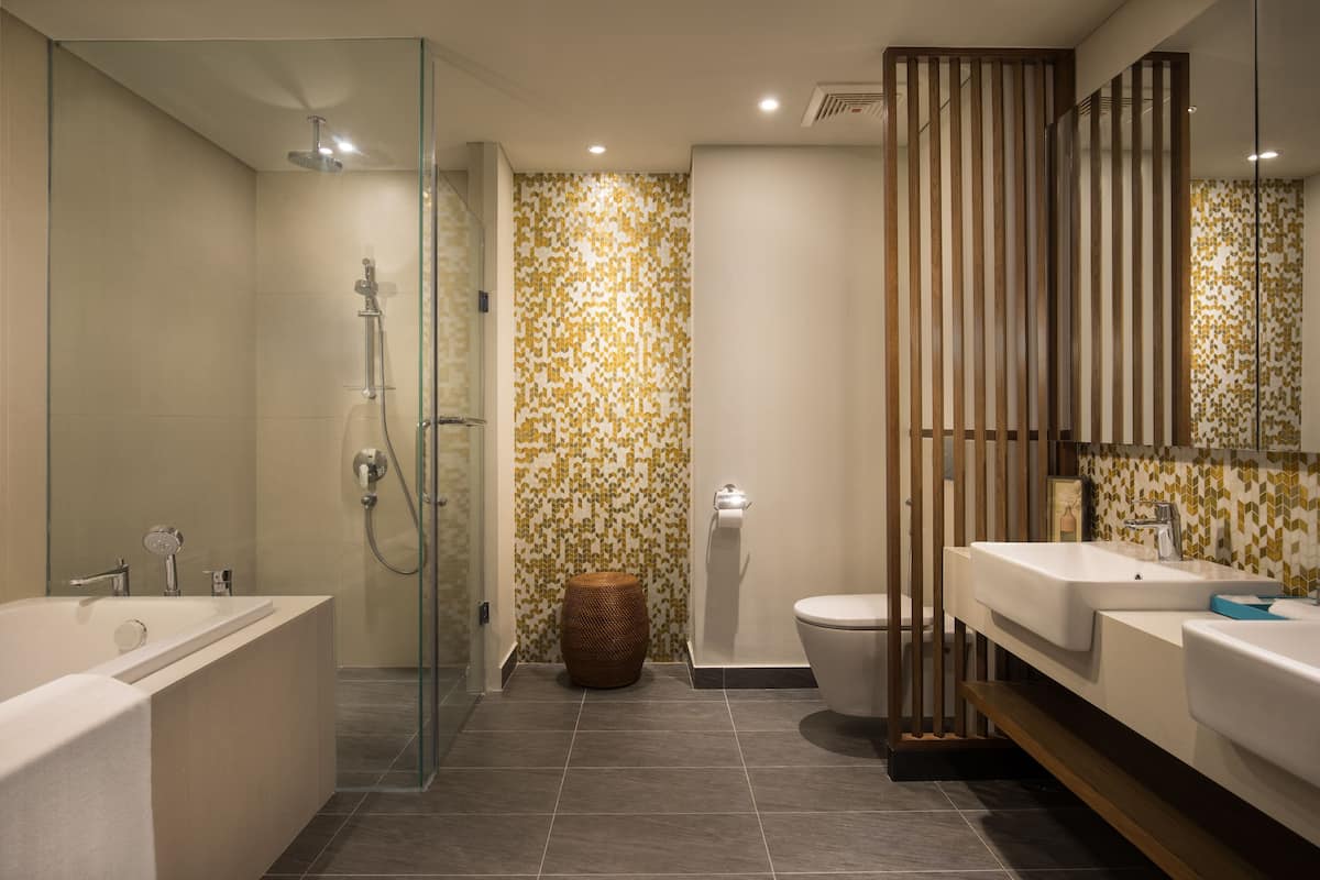 Bathroom | Designer toiletries, hair dryer, bathrobes, slippers