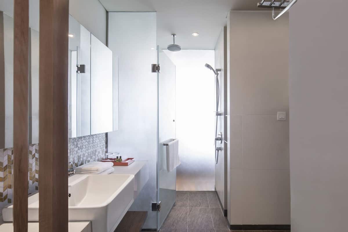 Bathroom | Designer toiletries, hair dryer, bathrobes, slippers