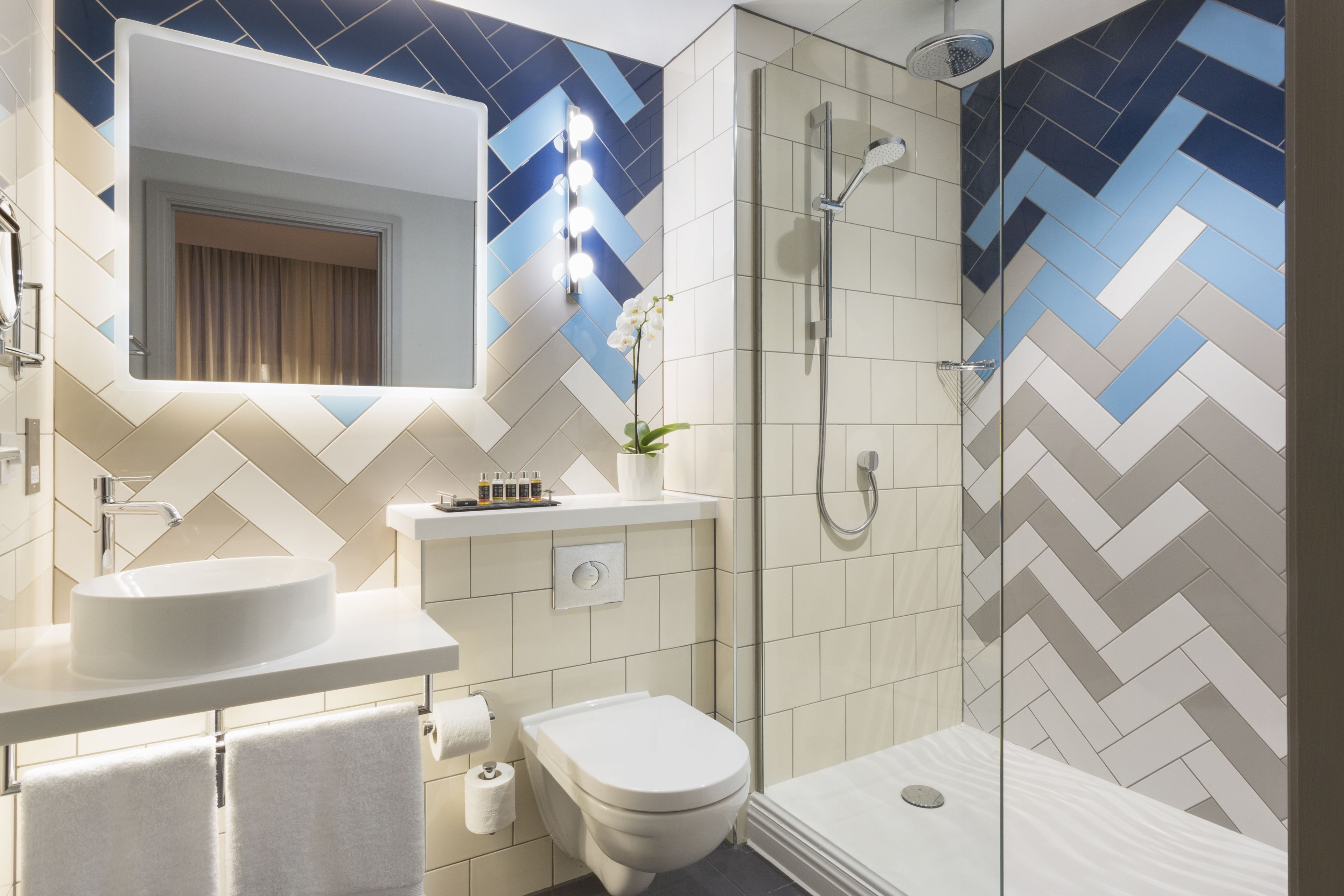 premium room, 1 queen bed | bathroom | shower, designer toiletries, hair dryer, bathrobes