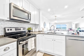 Direct Ocean View Deluxe Three-Bedroom Apartment - Unit 71 | Private kitchen | Fridge, microwave, oven, coffee/tea maker