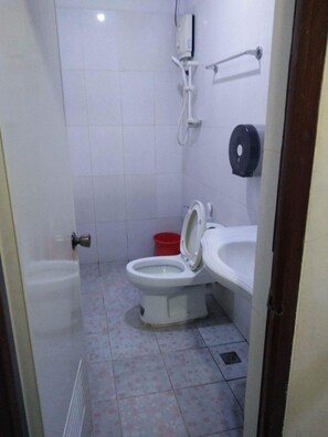 Shower, free toiletries, slippers, towels