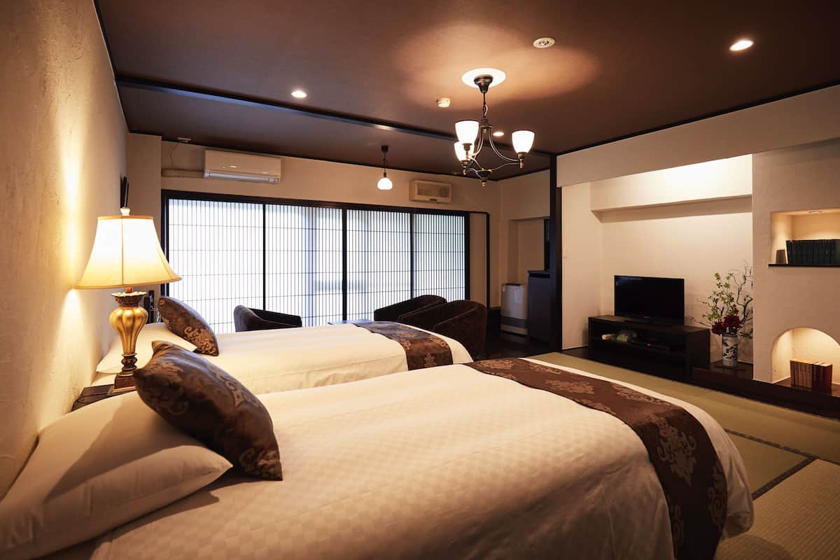 Standard Quadruple Room, Non Smoking, Terrace | Down comforters, in-room safe, desk, free WiFi
