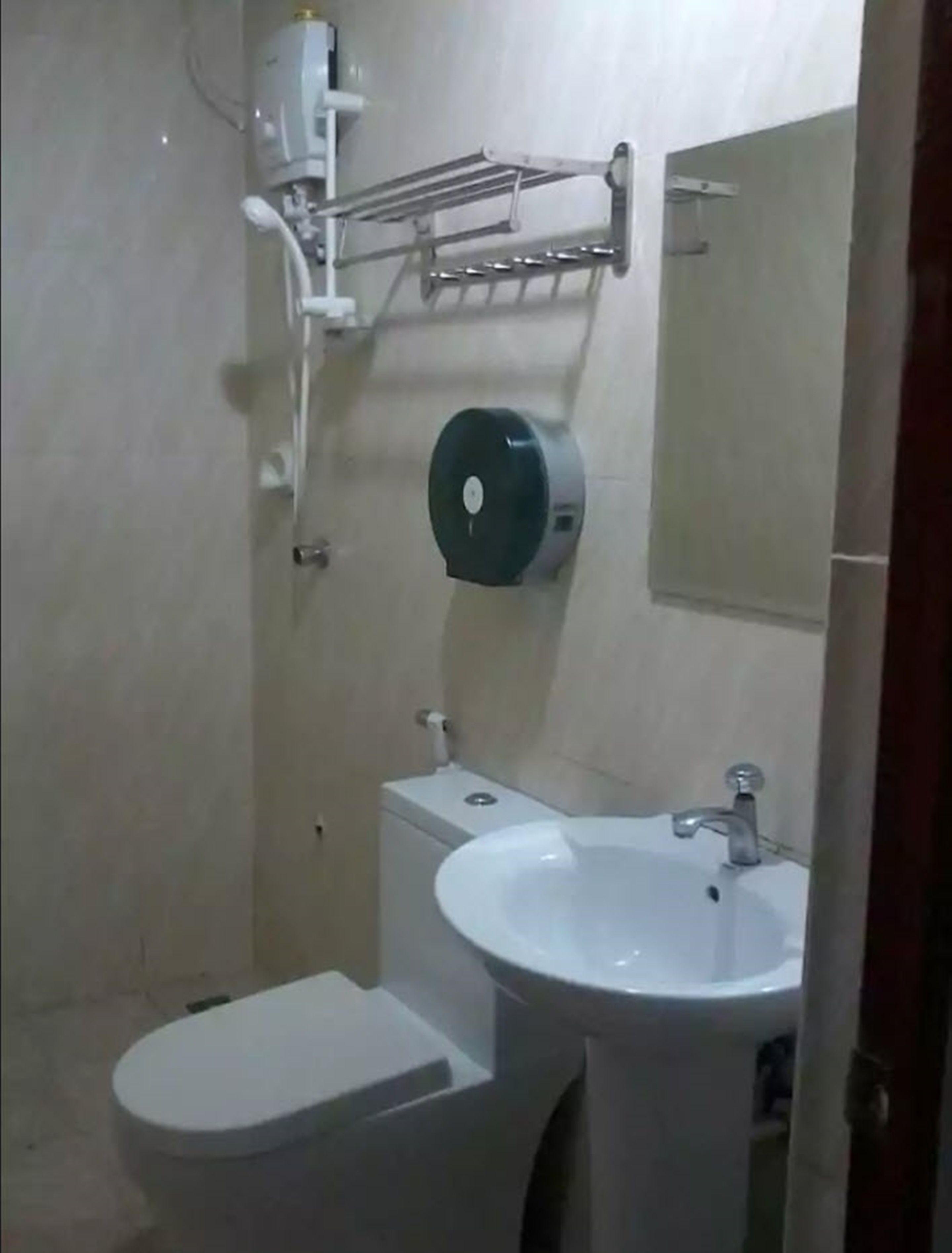 Shower, free toiletries, slippers, towels