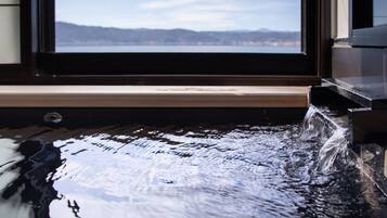 Separate tub and shower, deep soaking tub, free toiletries, hair dryer