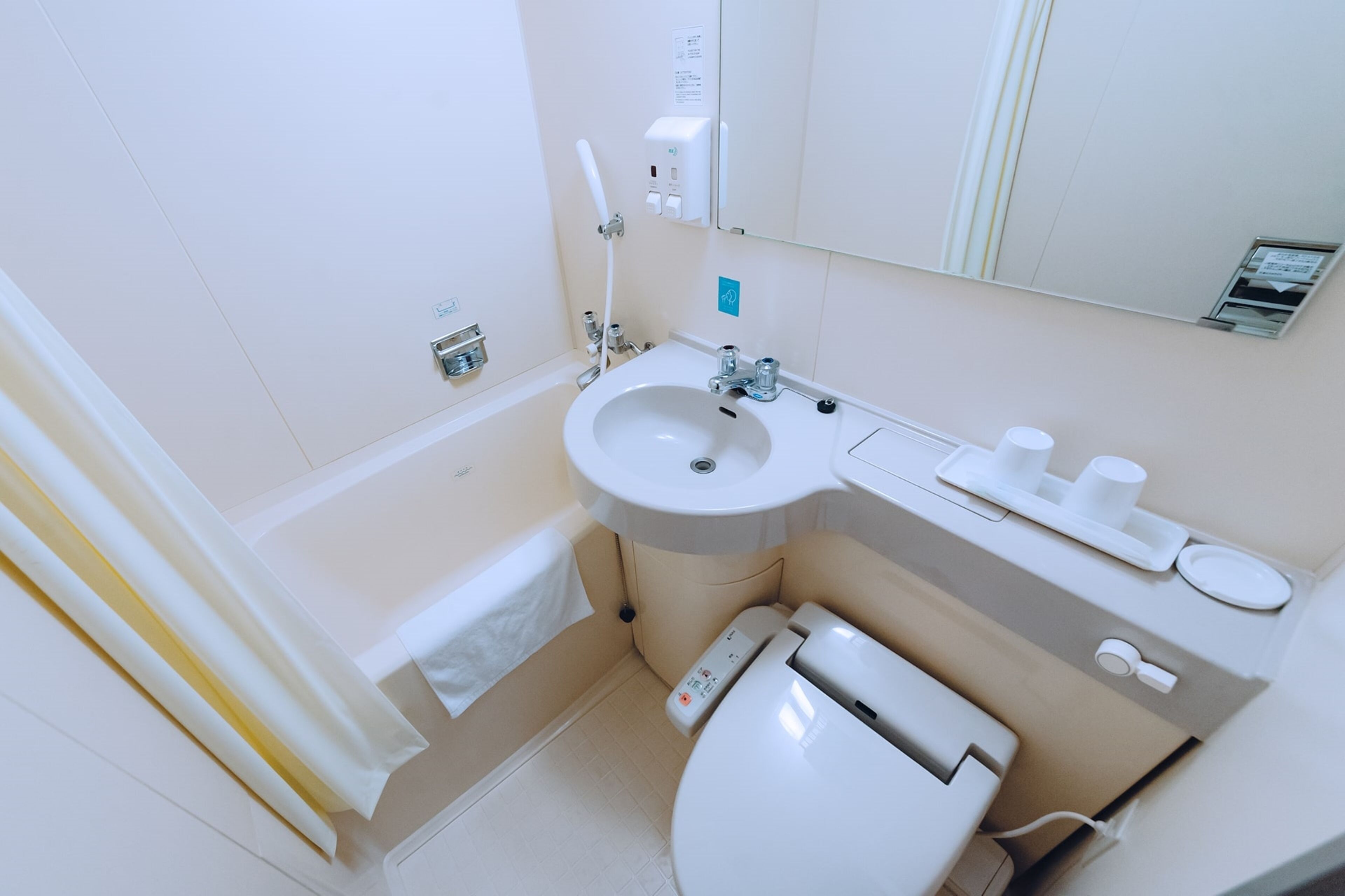 Combined shower/tub, free toiletries, hair dryer, bathrobes