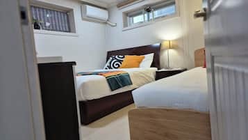 1 bedroom, premium bedding, down comforters, memory foam beds