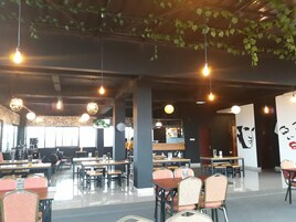 Breakfast, lunch, dinner served; local and international cuisine 