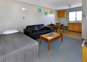 32-inch flat-screen TV with satellite channels, TV, DVD player