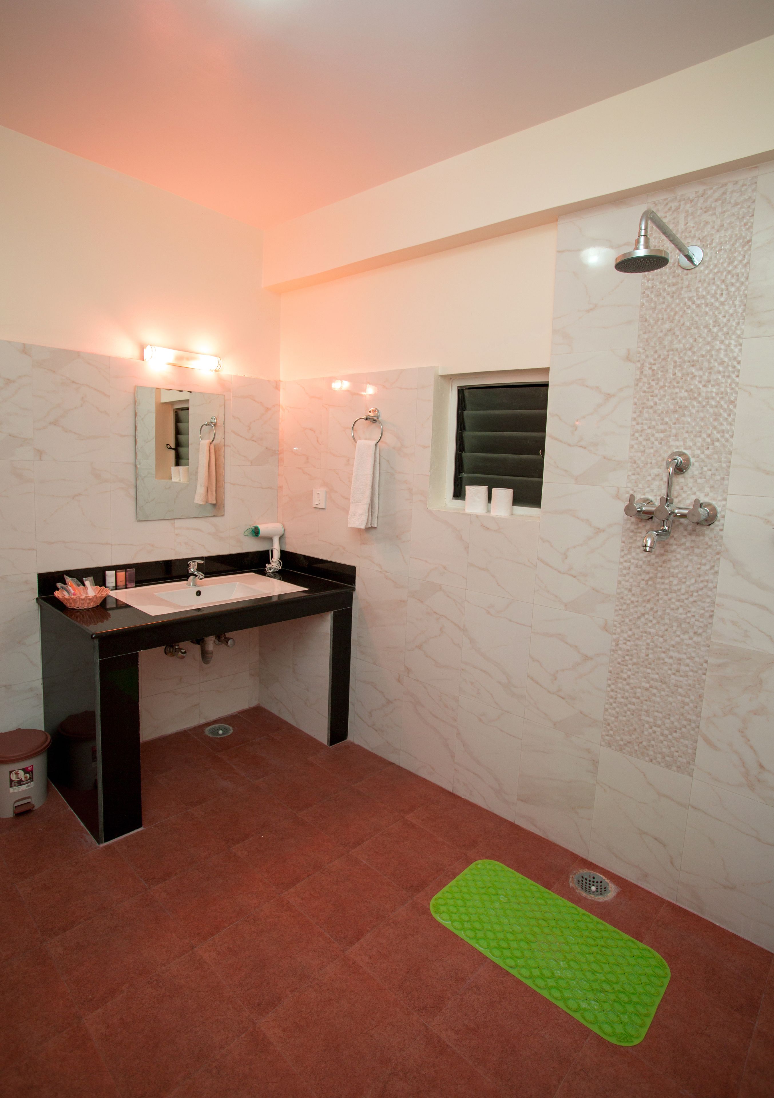 deluxe triple room, 3 single beds | bathroom | free toiletries, hair dryer, slippers, towels