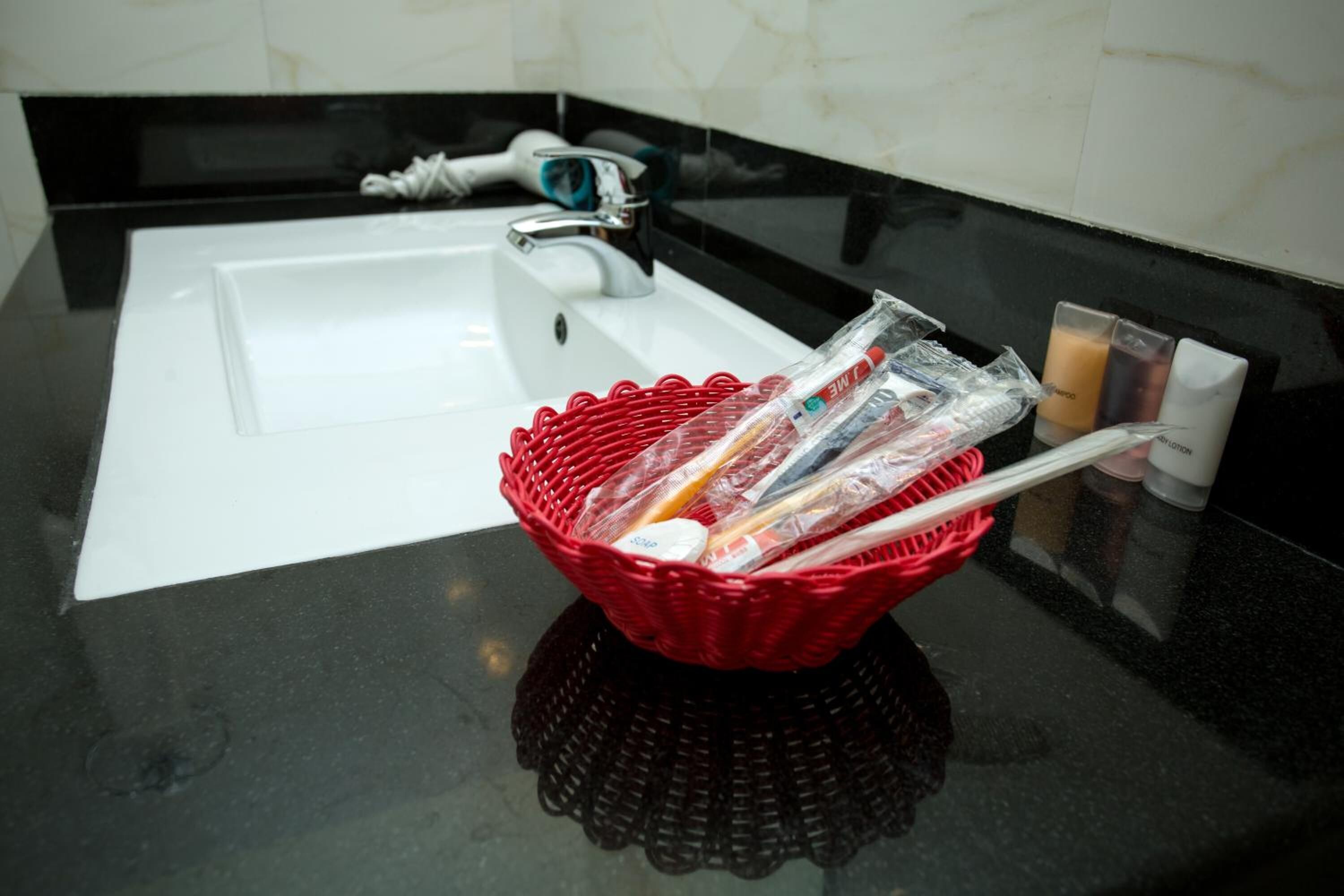 free toiletries, hair dryer, slippers, towels