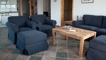 Apartment, 2 Bathrooms | Living area | Flat-screen TV