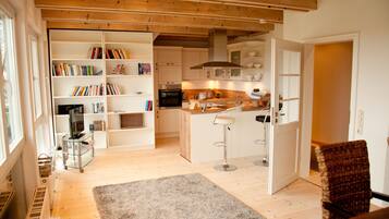 Apartment, Garden View | In-room safe, iron/ironing board, free WiFi, bed sheets