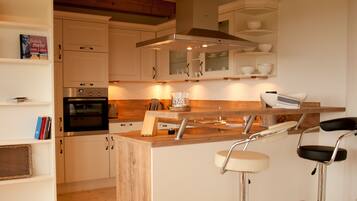 Apartment, Garden View | Private kitchen | Fridge, coffee/tea maker, electric kettle, toaster