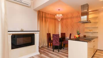 Deluxe Apartment, 2 Bedrooms, Balcony | Private kitchen | Fridge, electric kettle