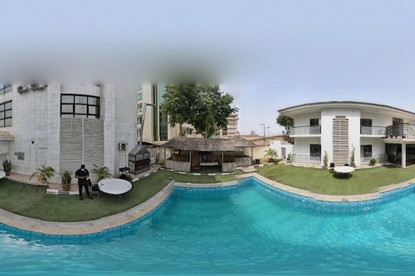 Outdoor pool, pool umbrellas, sun loungers