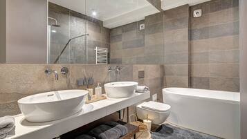 Luxury Apartment, 2 Bedrooms, River View | Bathroom | Separate bathtub and shower, jetted bath, free toiletries, hair dryer