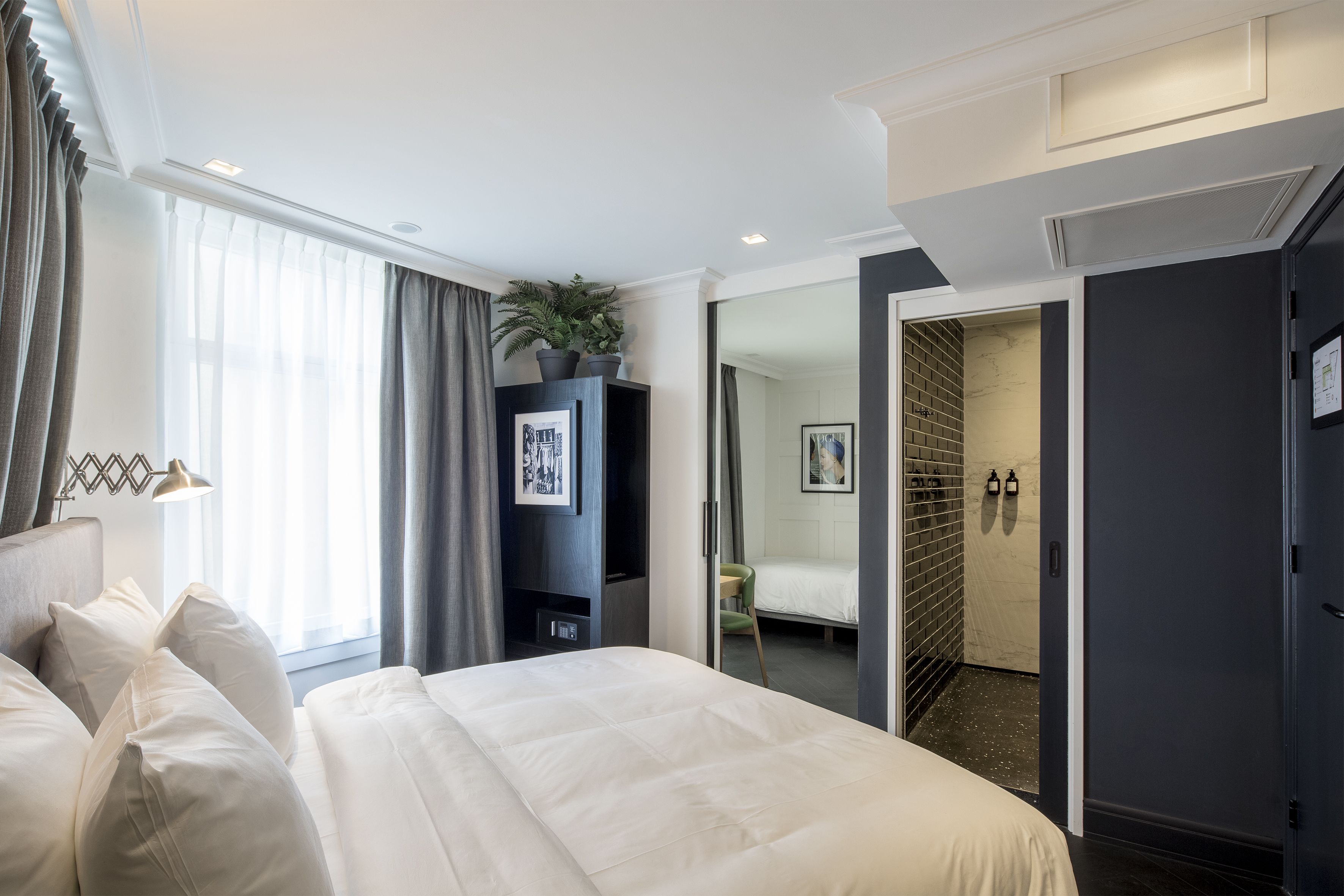 deluxe triple room | premium bedding, down duvets, in-room safe, desk