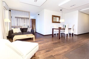Apartment, Accessible, City View | Living area | Flat-screen TV - Vilnius Apartments & Suites Smolensko (Vilnius)