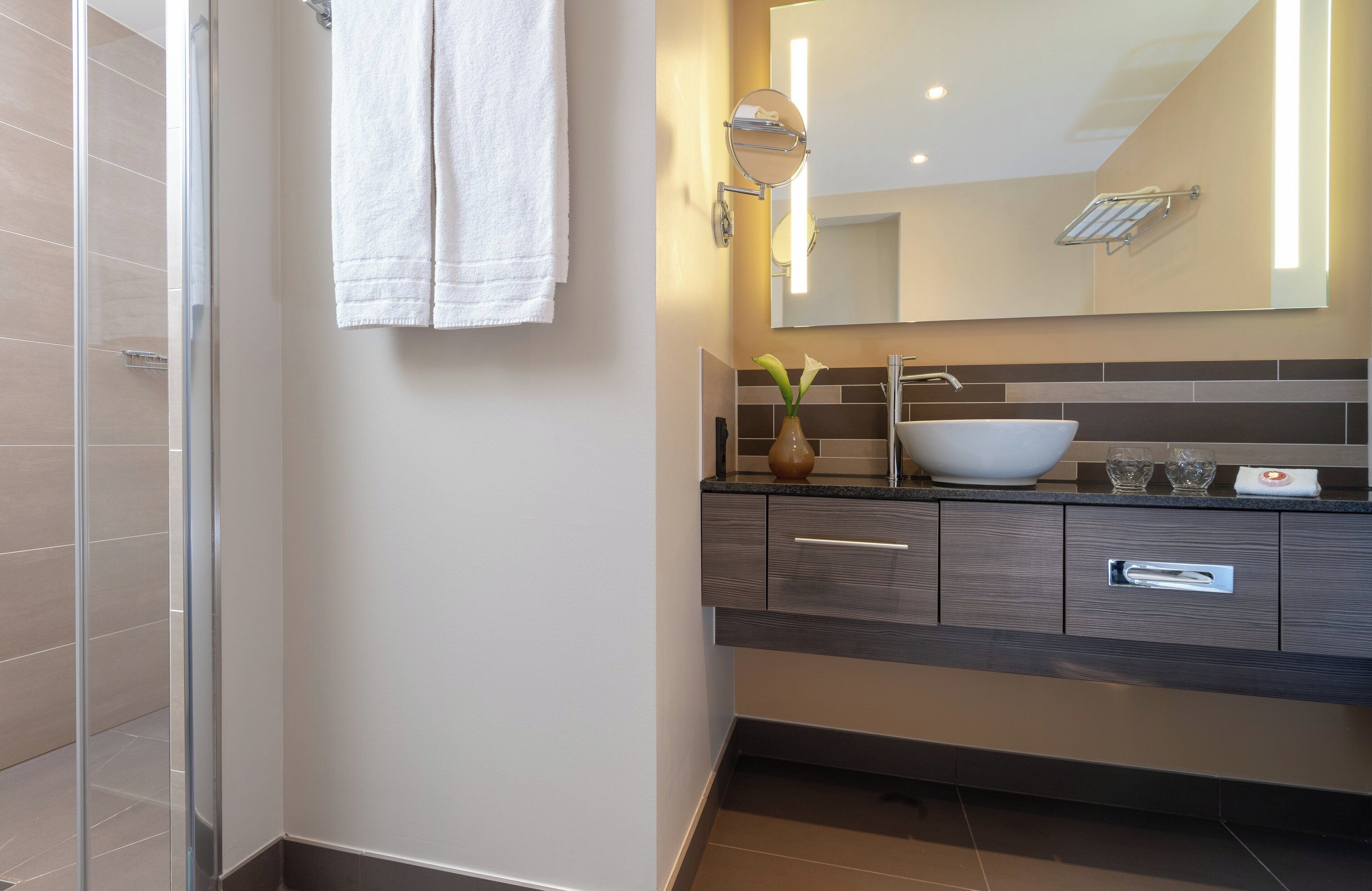 shower, free toiletries, hair dryer, towels