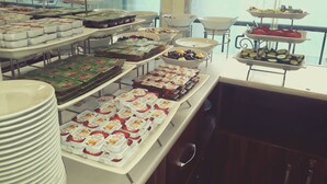 A buffet with various food items and dishes. - Marmara Deluxe Hotel (Istanbul)