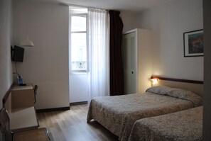 Triple Room | Premium bedding, in-room safe, desk, blackout curtains