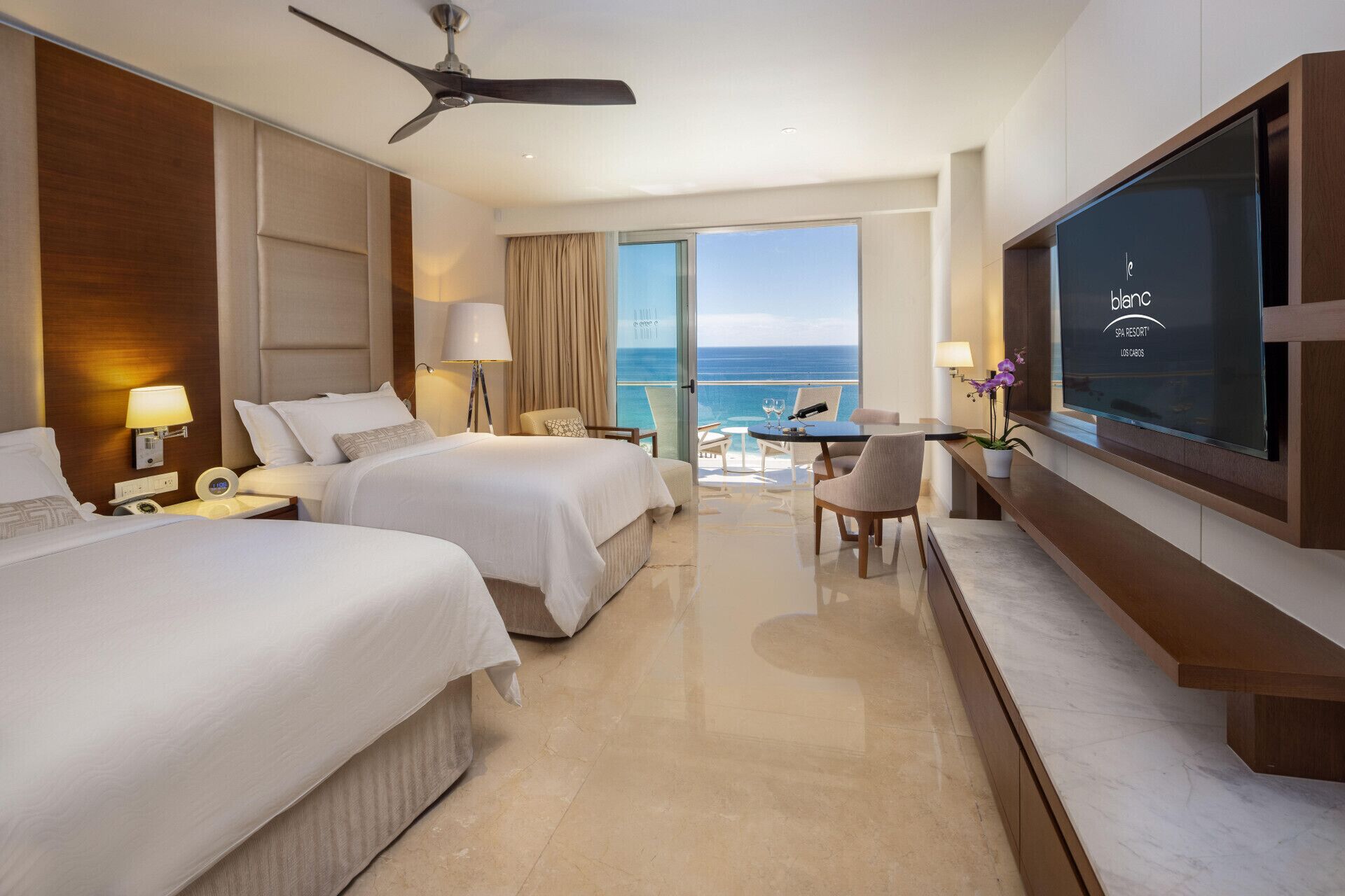 Premium bedding, down comforters, free minibar, in-room safe