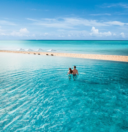 4 outdoor pools, cabanas (surcharge), pool umbrellas. Le Blanc Spa Resort Los Cabos - Adults Only - All-Inclusive