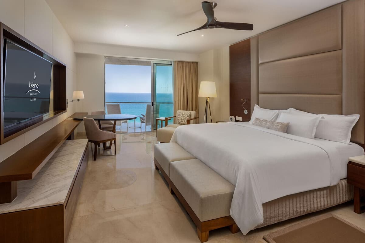 Premium bedding, down comforters, free minibar, in-room safe