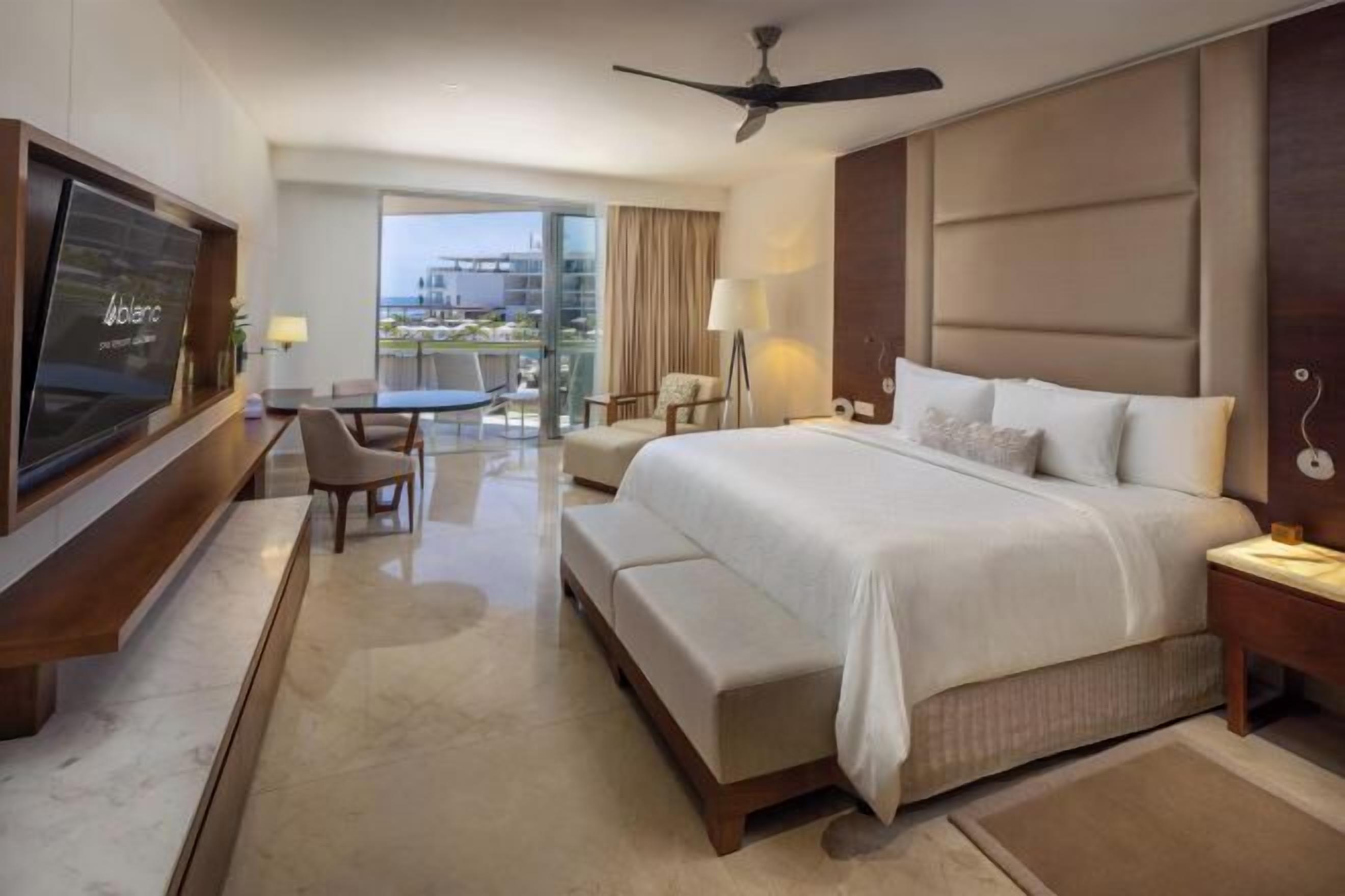 Premium bedding, down comforters, free minibar, in-room safe