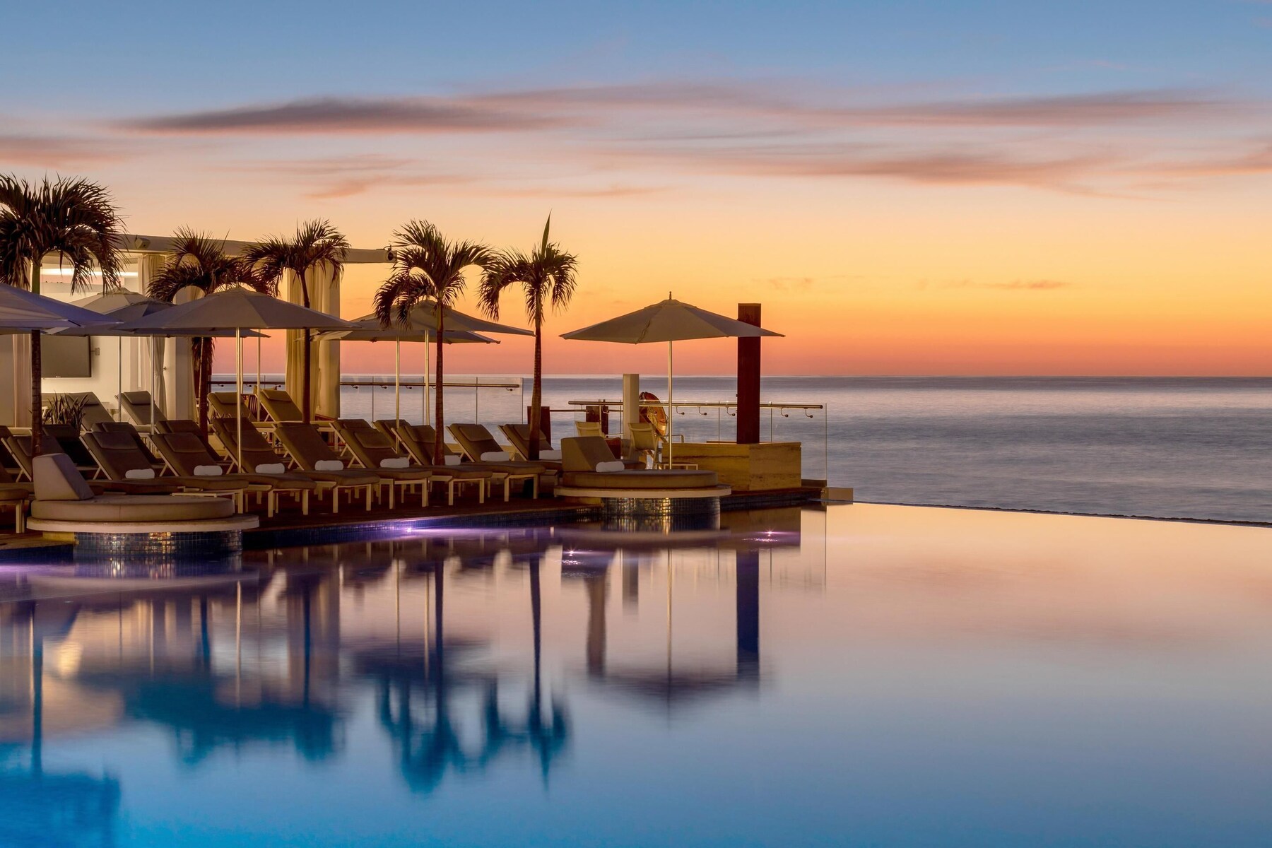 4 outdoor pools, pool cabanas (surcharge), pool umbrellas