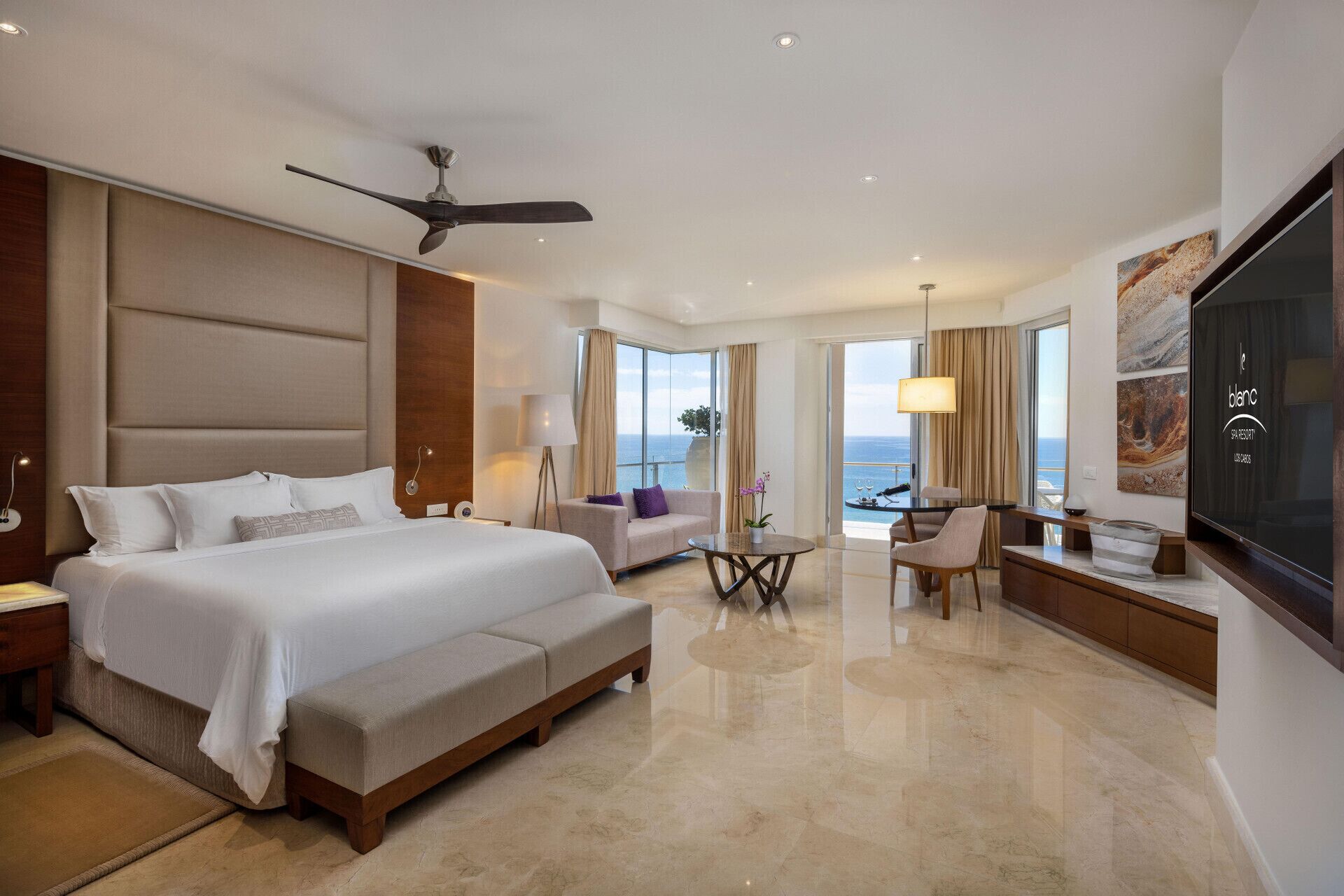 Premium bedding, down comforters, free minibar, in-room safe
