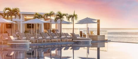 4 outdoor pools, pool cabanas (surcharge), pool umbrellas