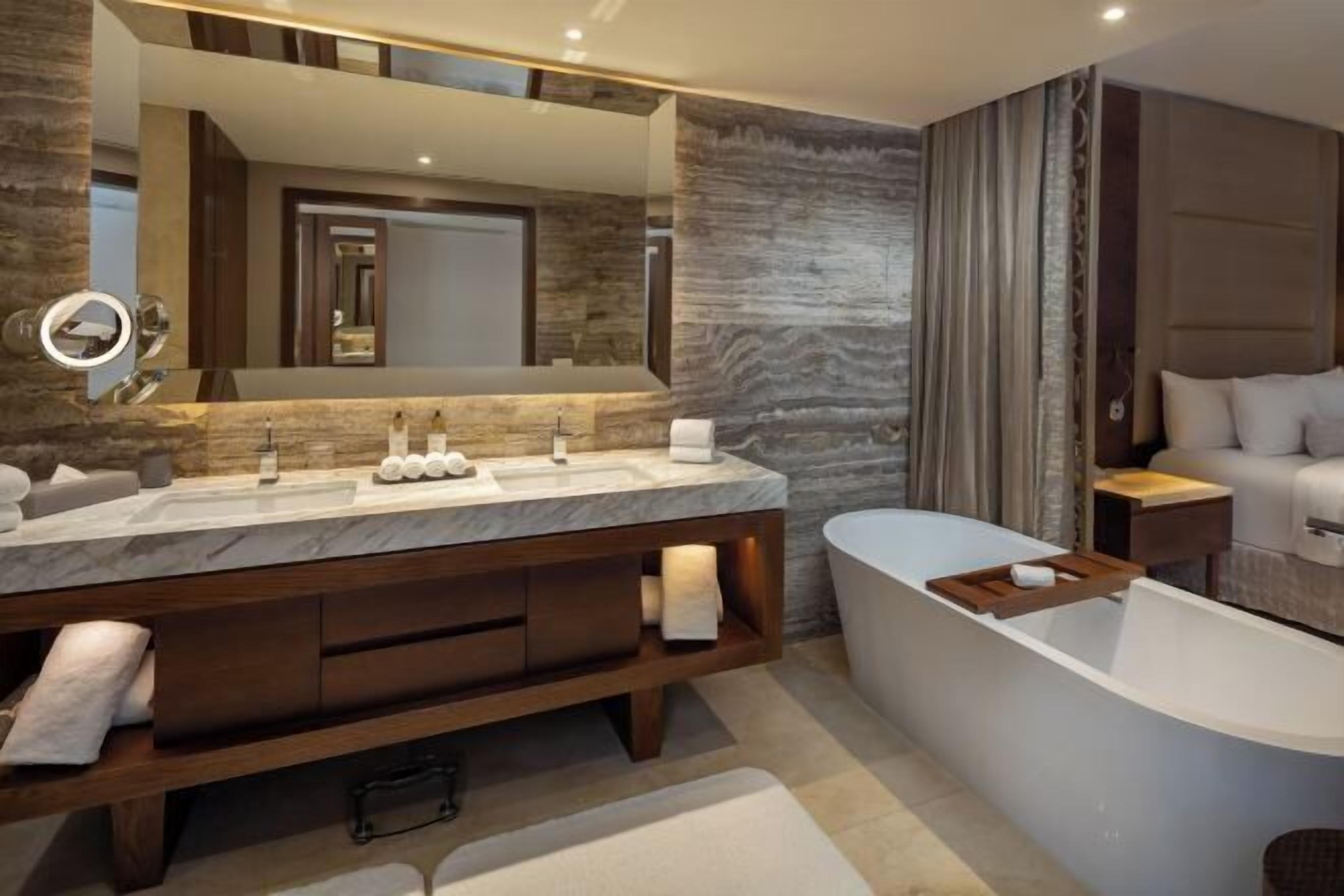 Bathroom | Separate tub and shower, designer toiletries, hair dryer, bathrobes