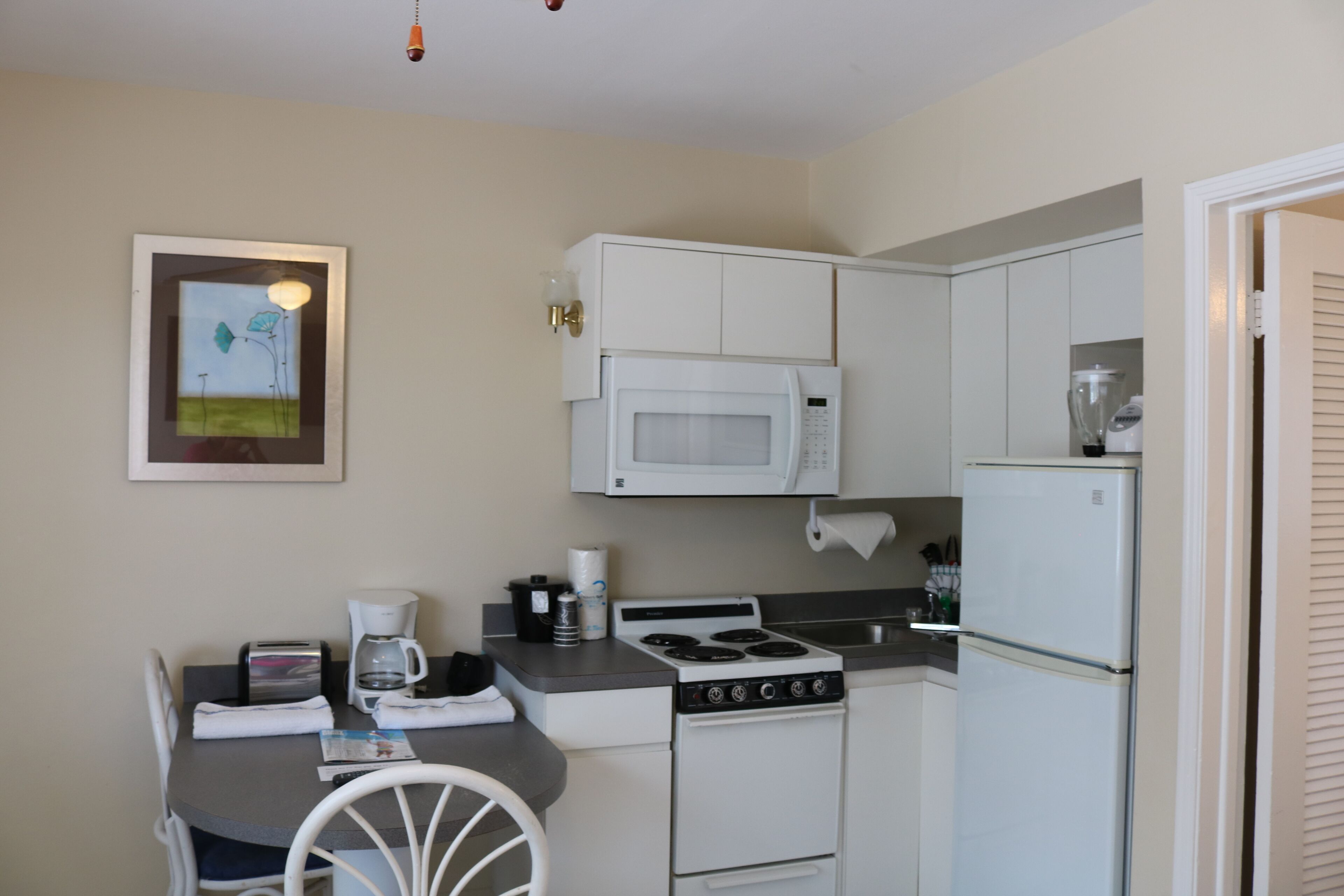 room, 1 king bed with sofa bed, kitchen, courtyard view (1st floor) | private kitchen | fridge, microwave, coffee/tea maker, cookware/dishes/utensils