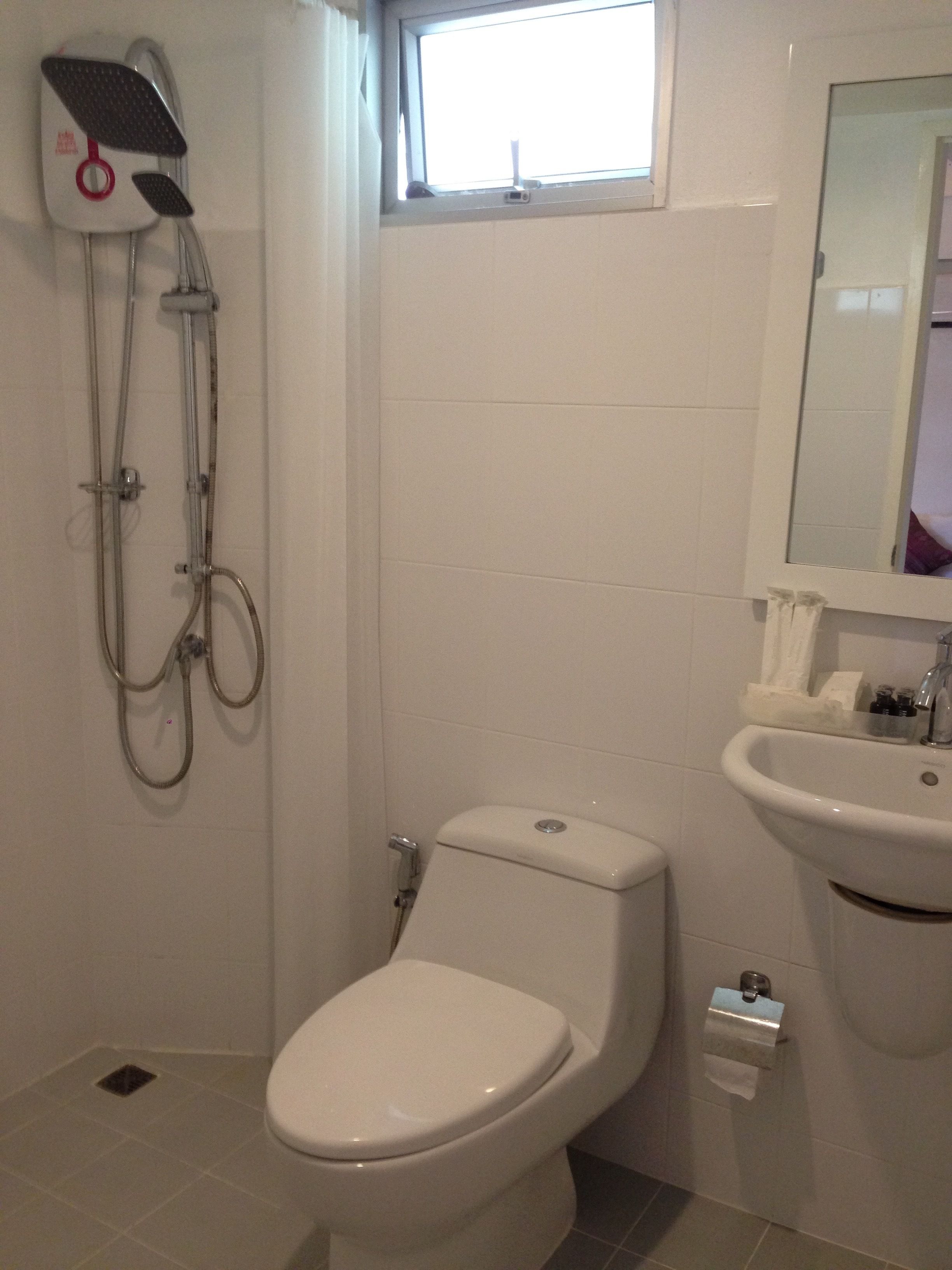 Shower, free toiletries, hair dryer, slippers