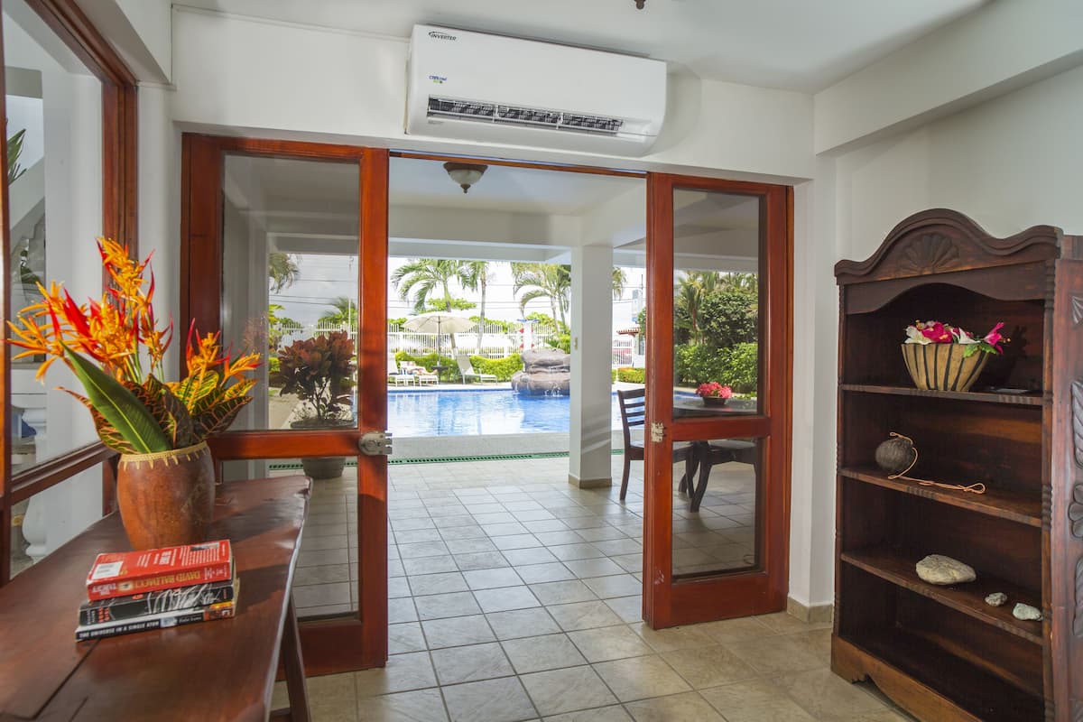 Condo, 2 Bedrooms, Ocean View (A2) | Iron/ironing board, cots/infant beds, rollaway beds, free WiFi