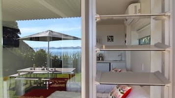 Quarto luxo, vista parcial para o oceano, de frente para o mar | 1 quarto, roupas de cama premium, cofres nos quartos, Wi-Fi de cortesia