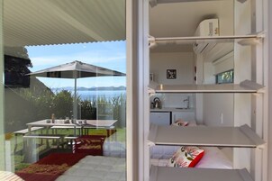Quarto luxo, vista parcial para o oceano, de frente para o mar | 1 quarto, roupas de cama premium, cofres nos quartos, Wi-Fi de cortesia