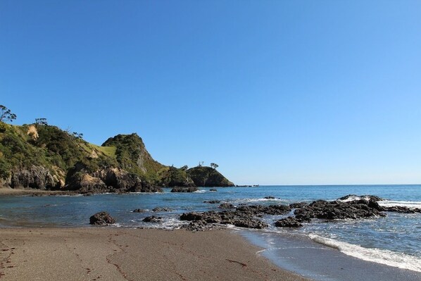 On the beach, kayaking