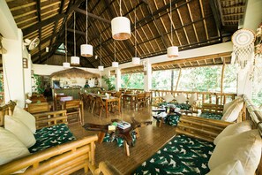 Breakfast, lunch served; local and international cuisine, garden views  - Fox & The Firefly Cottages (Loboc)