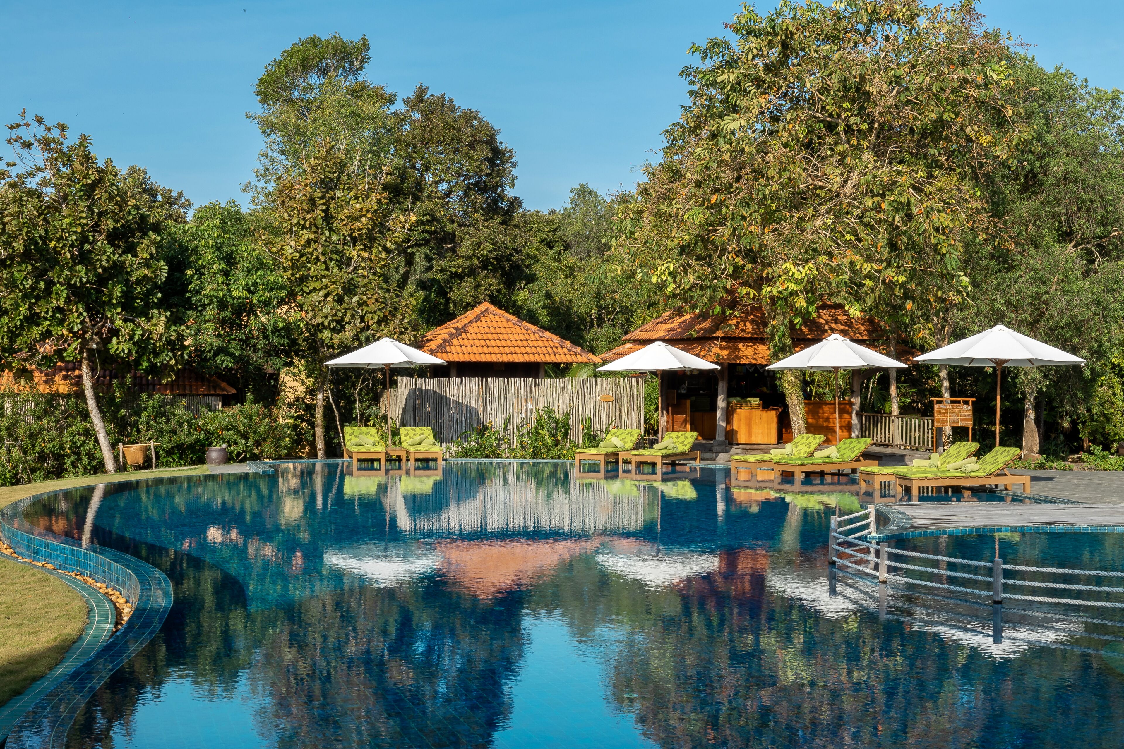 outdoor pool, open 6 am to 7:00 pm, pool umbrellas, pool loungers