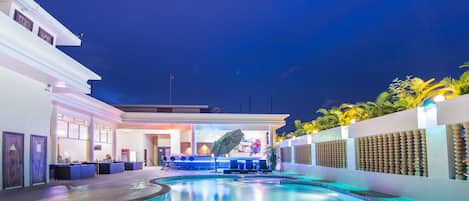 Indoor pool, outdoor pool, open 6:00 AM to 9:00 PM, pool umbrellas