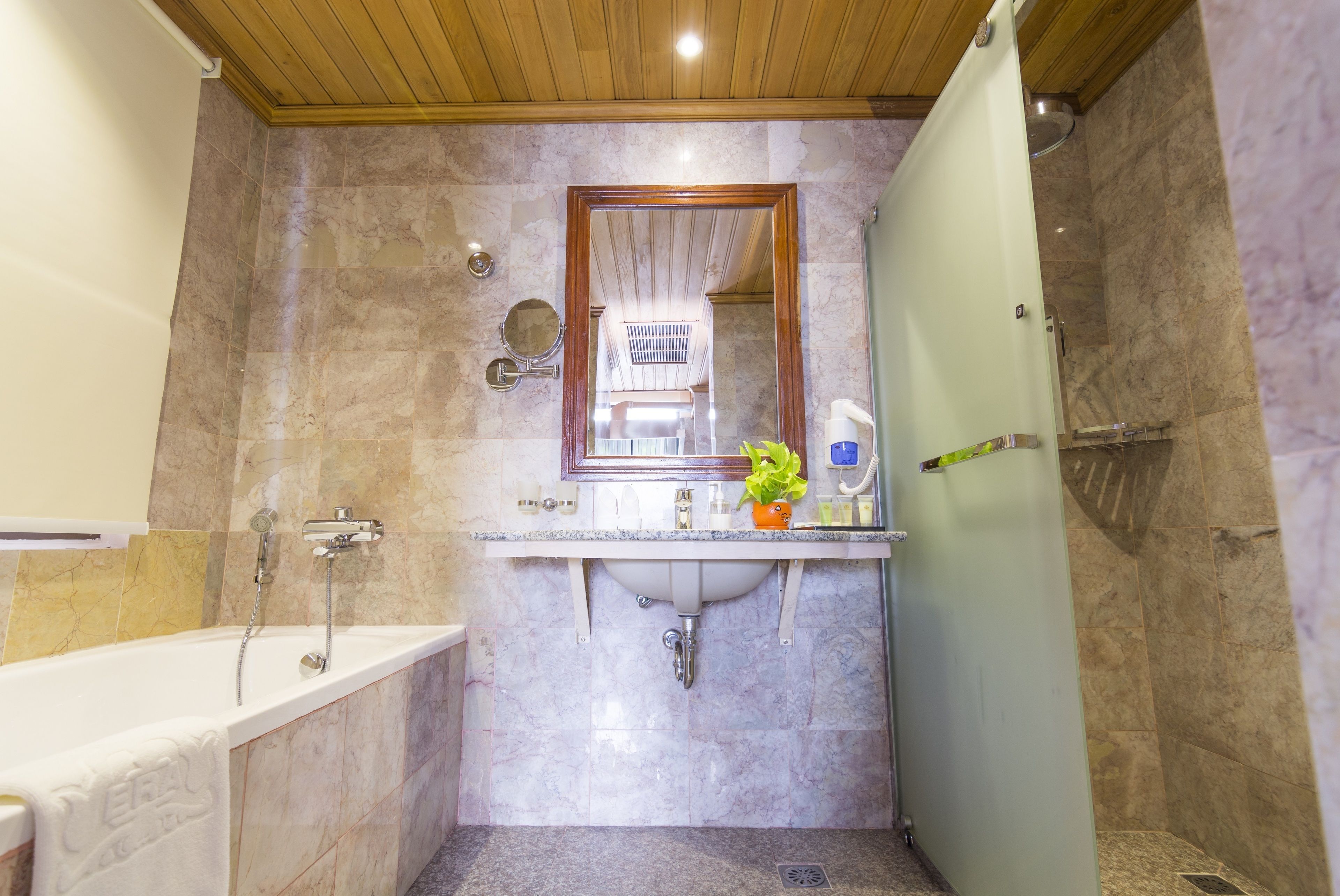 separate bathtub and shower, deep-soaking bathtub, free toiletries