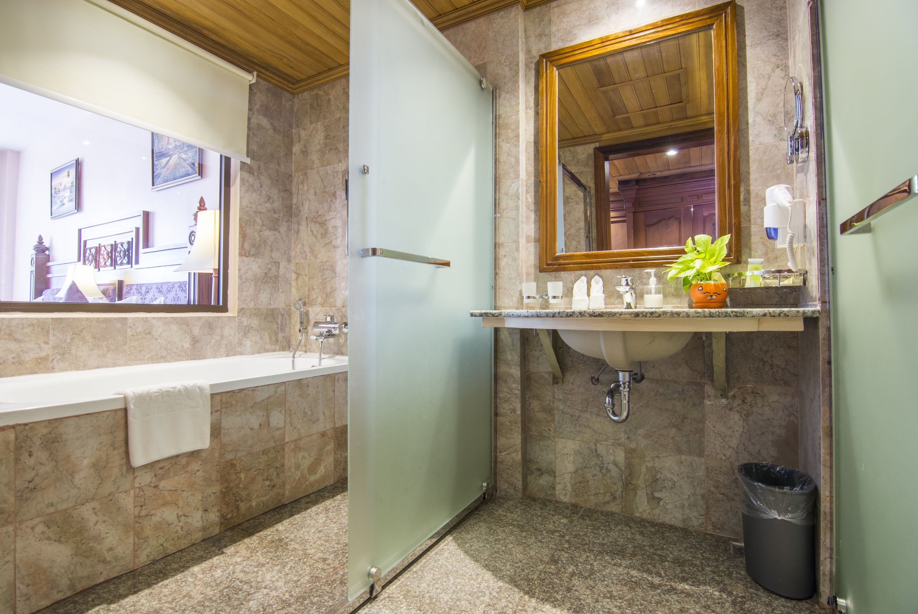 separate bathtub and shower, deep-soaking bathtub, free toiletries