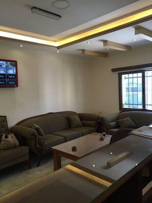 Coin salon dans le hall