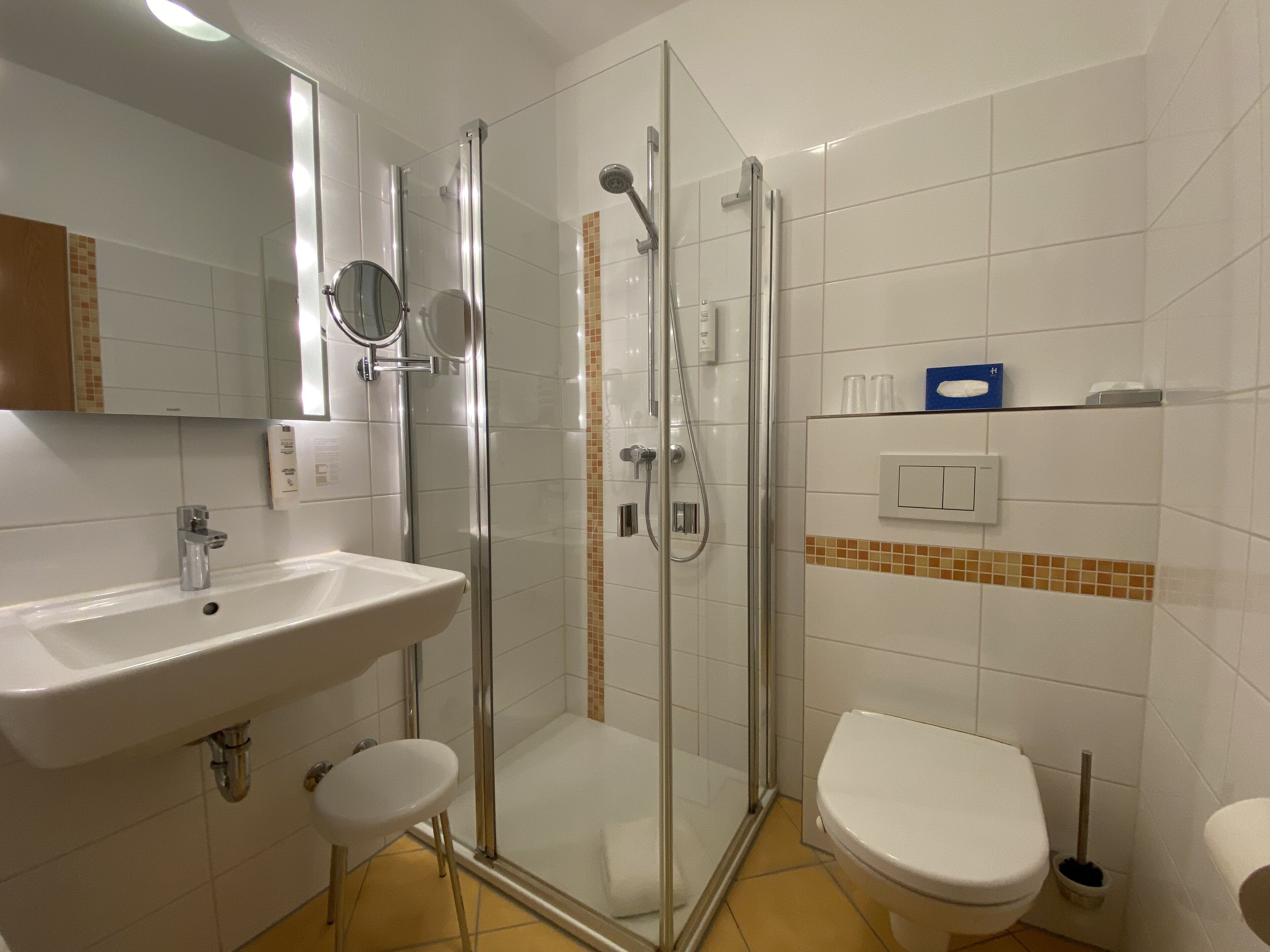 superior double room | bathroom | shower, free toiletries, hair dryer, towels