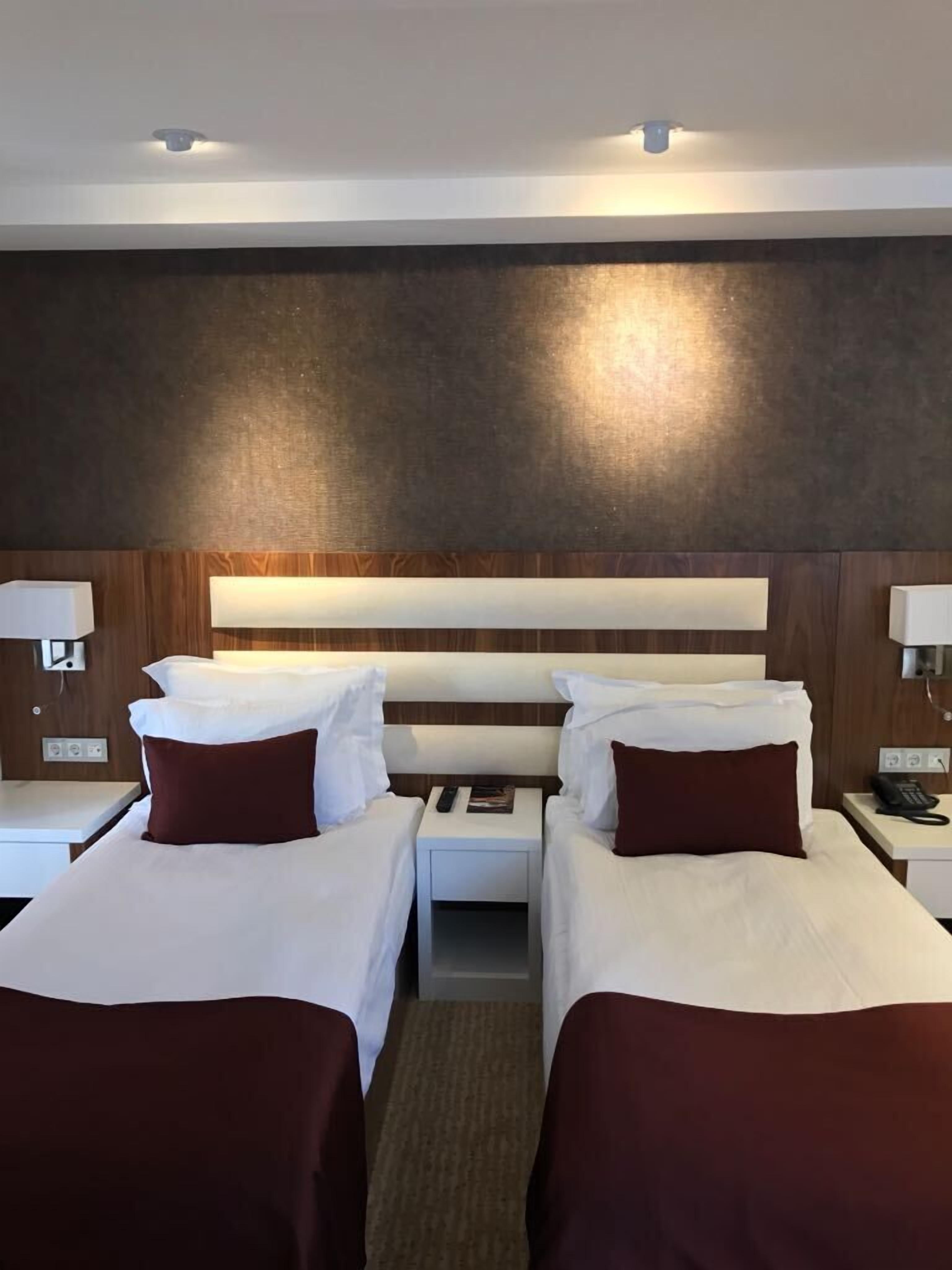 business twin room | premium bedding, free minibar items, in-room safe, desk